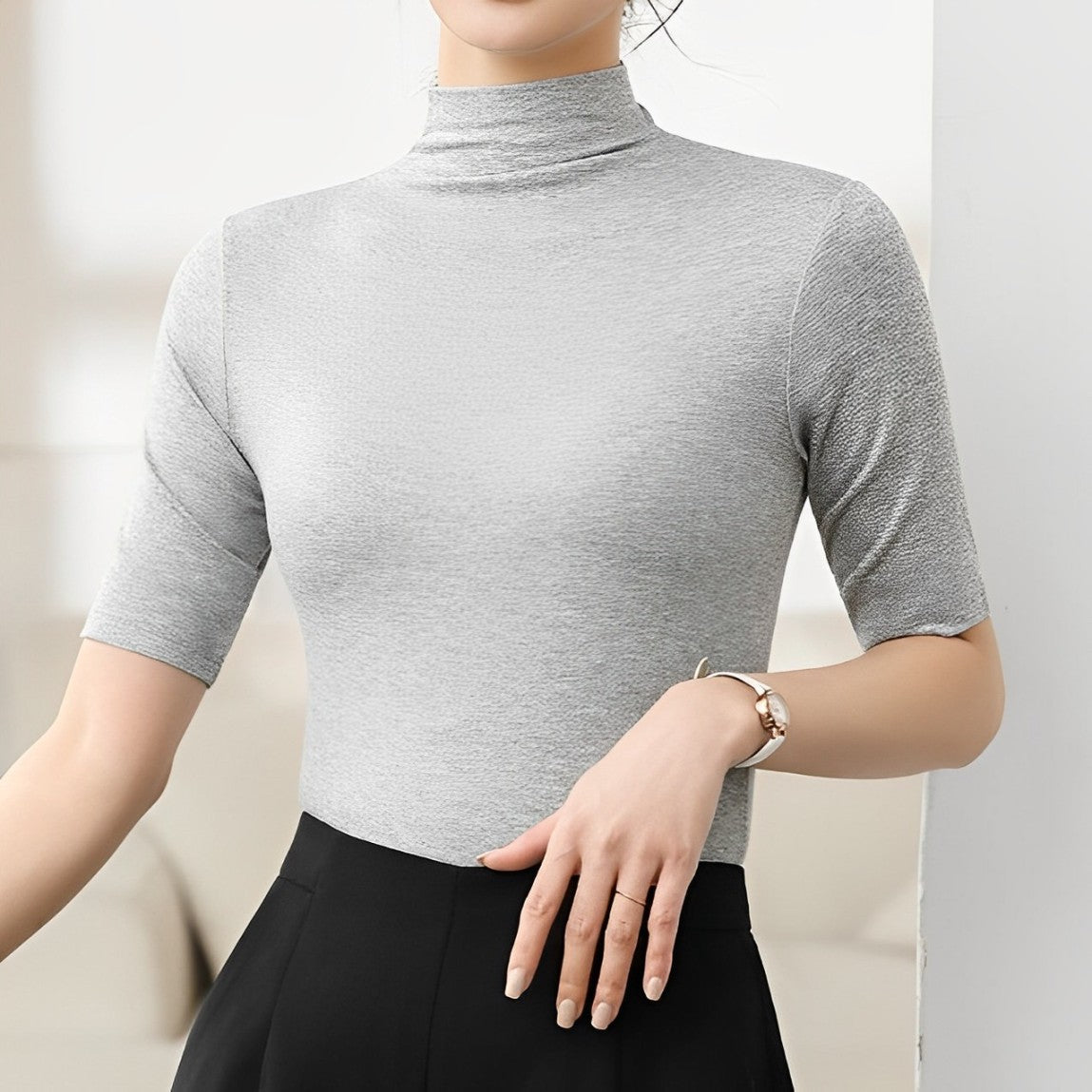 Seamless, close-fitting turtleneck top