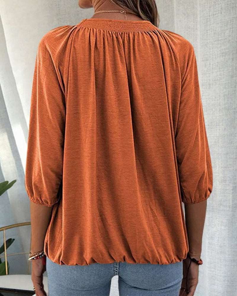 Pleated blouse with quarter sleeves