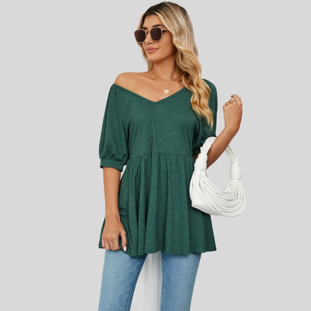 Wide flared peplum top with V-neckline