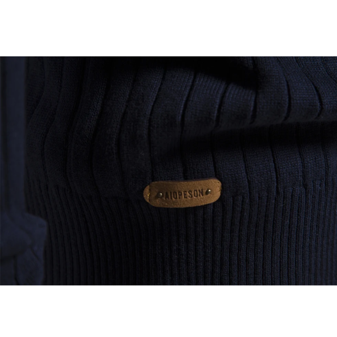 Ribbed knitted pullover with zip and stand-up collar