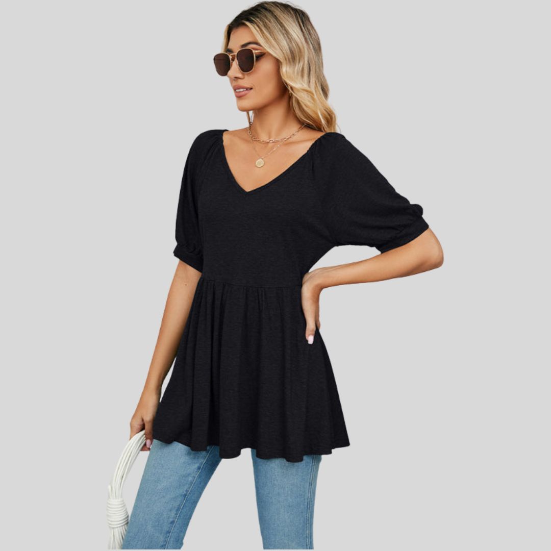 Wide flared peplum top with V-neckline