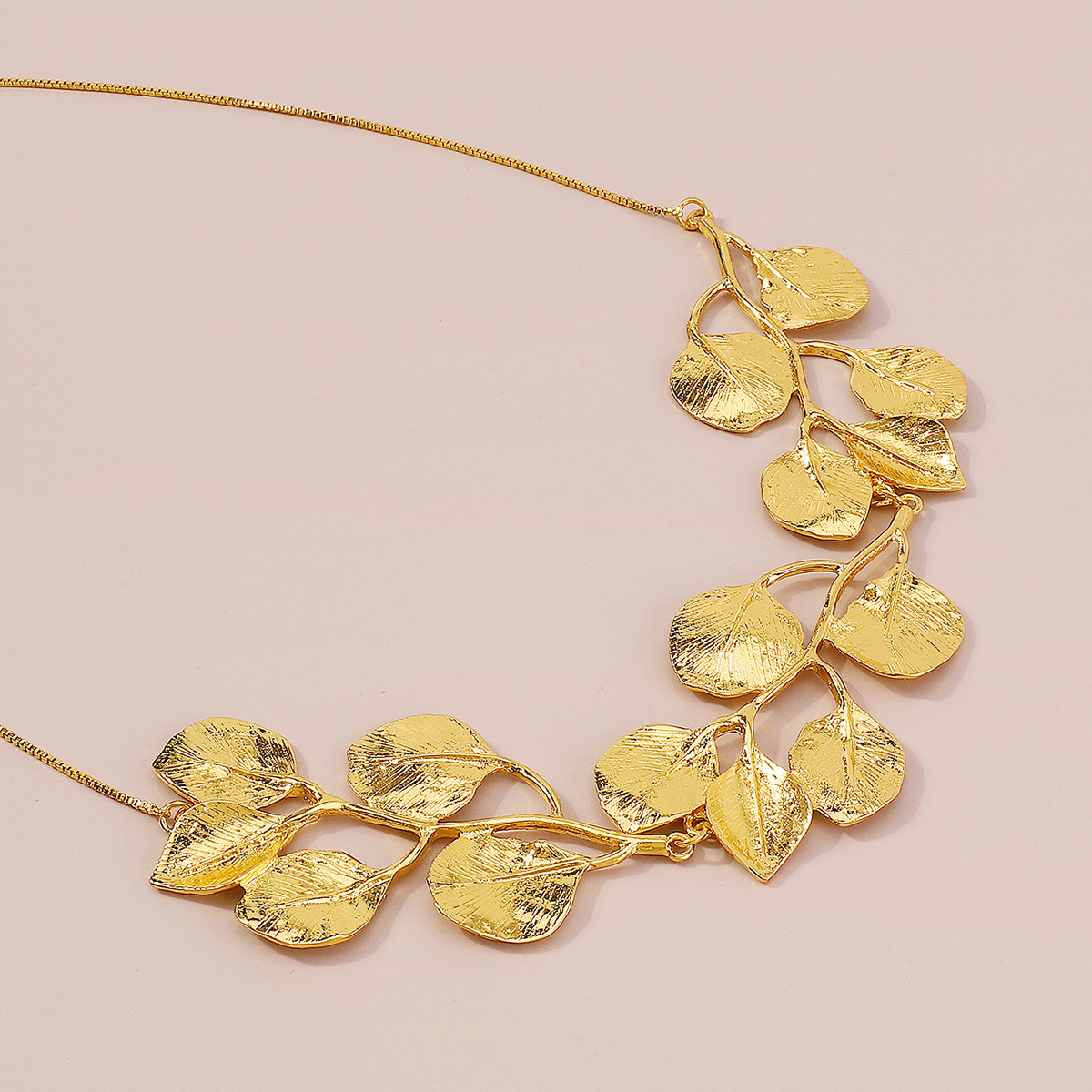 Golden vintage fig leaf necklace