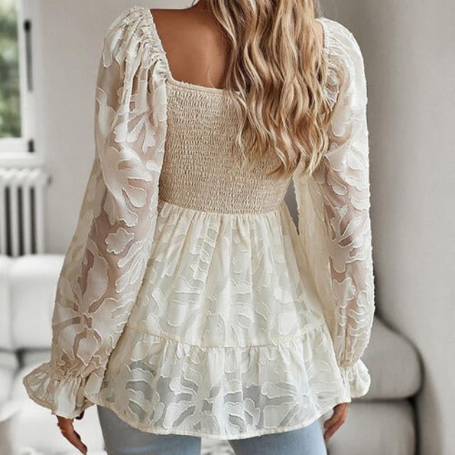 Ruffled blouse with a square neckline and sheer sleeves