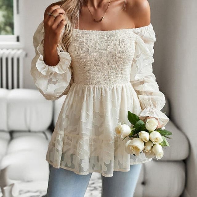 Ruffled blouse with a square neckline and sheer sleeves