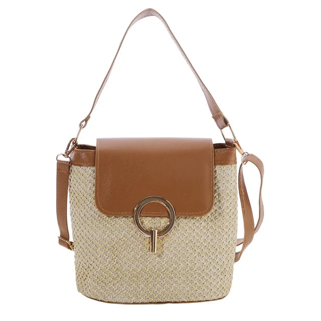 Ladies straw woven beach bag with metal fastening and PU strap