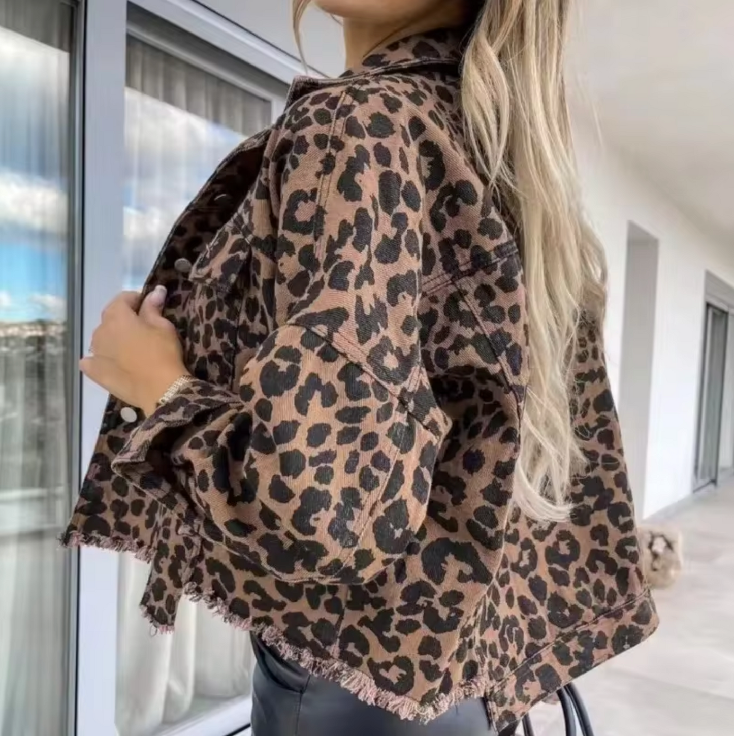 Denim jacket with leopard print