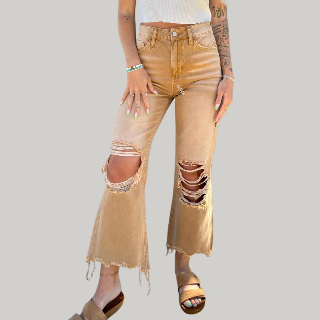 Flared jeans with distressed knees