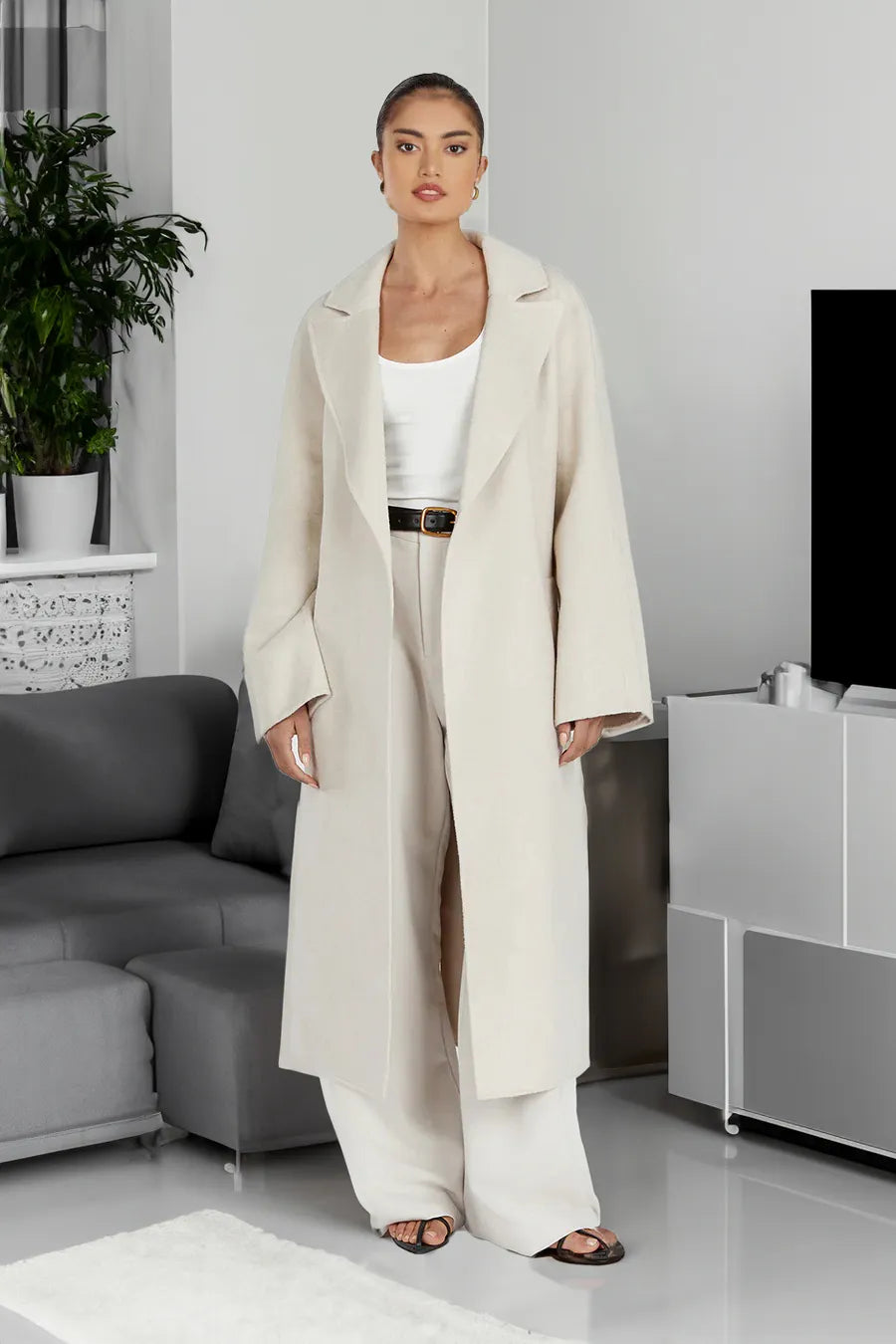 Stylish long women's trench coat in oversize style