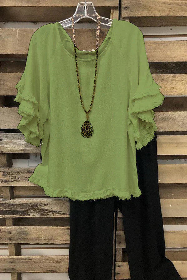 Ruffled cotton blouse with round neckline