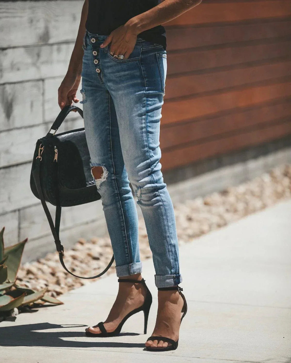 Light blue ripped jeans