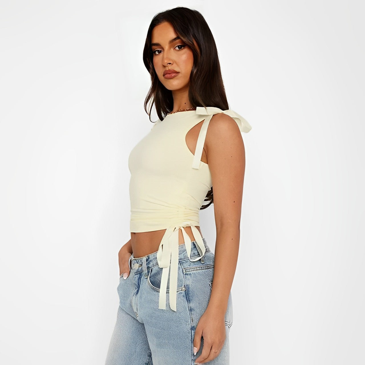 Sleeveless crop top with bow tie and drawstring