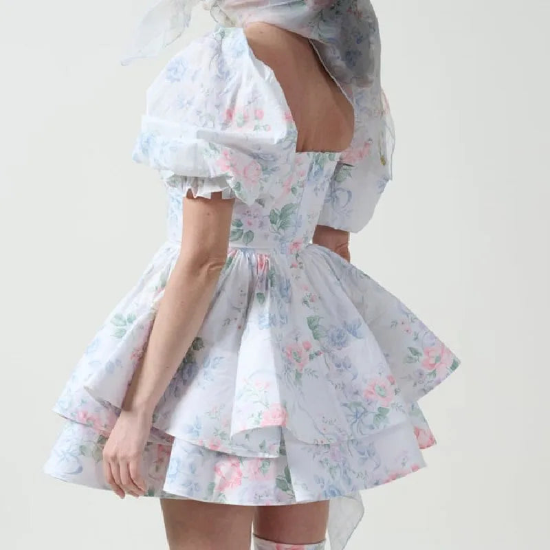 Pastel-coloured dress with floral pattern