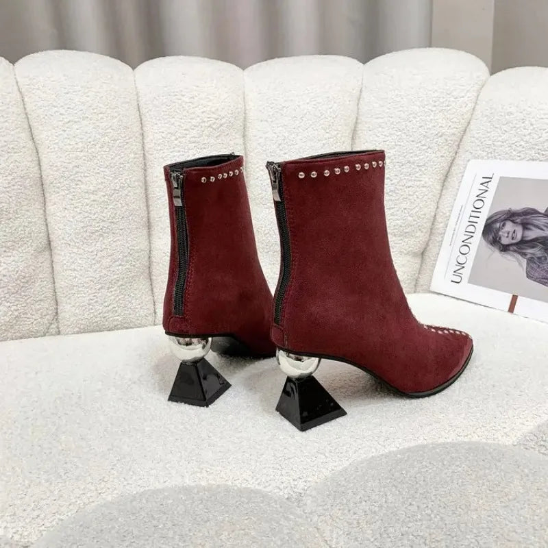 Stylish ankle boots with pearl embellishments