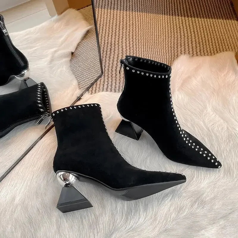 Stylish ankle boots with pearl embellishments