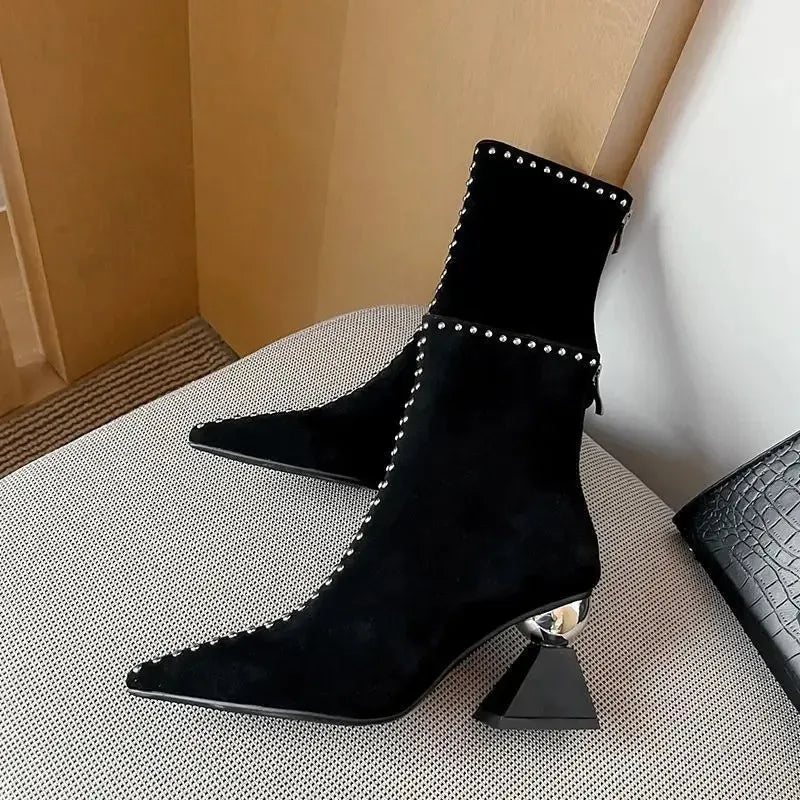 Stylish ankle boots with pearl embellishments