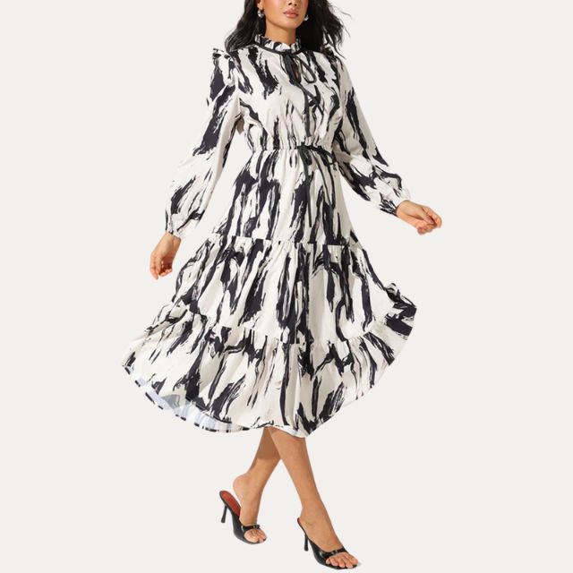 Midi dress with abstract print and tiered skirt