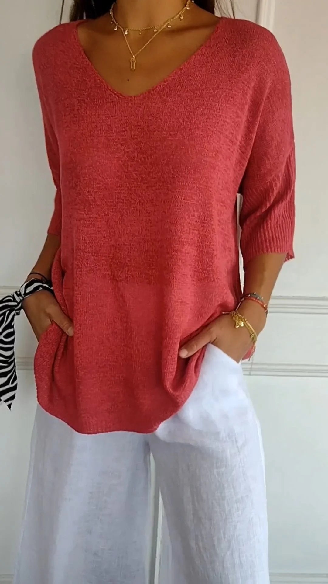 Knitted top with V-neckline