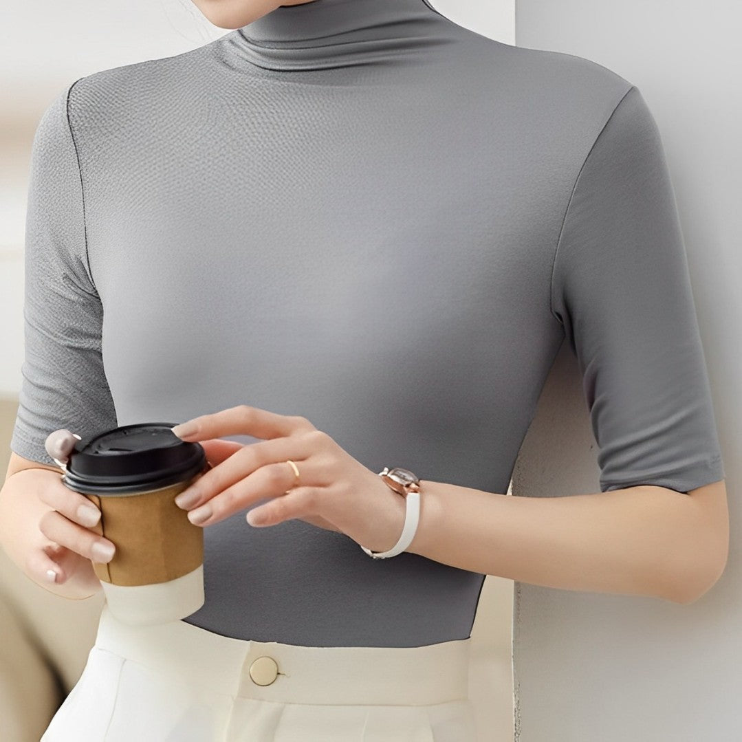 Seamless, close-fitting turtleneck top