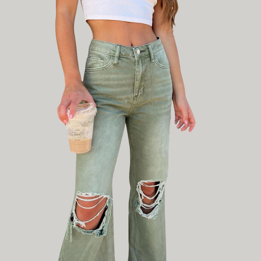 Flared jeans with distressed knees