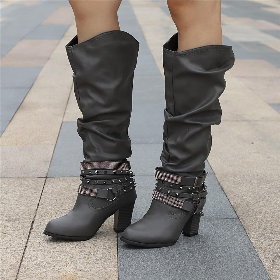 Elegant leather boots with block heel