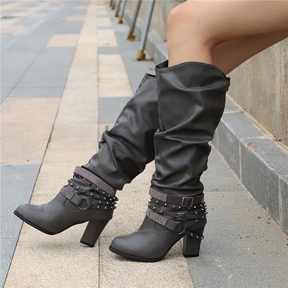 Elegant leather boots with block heel