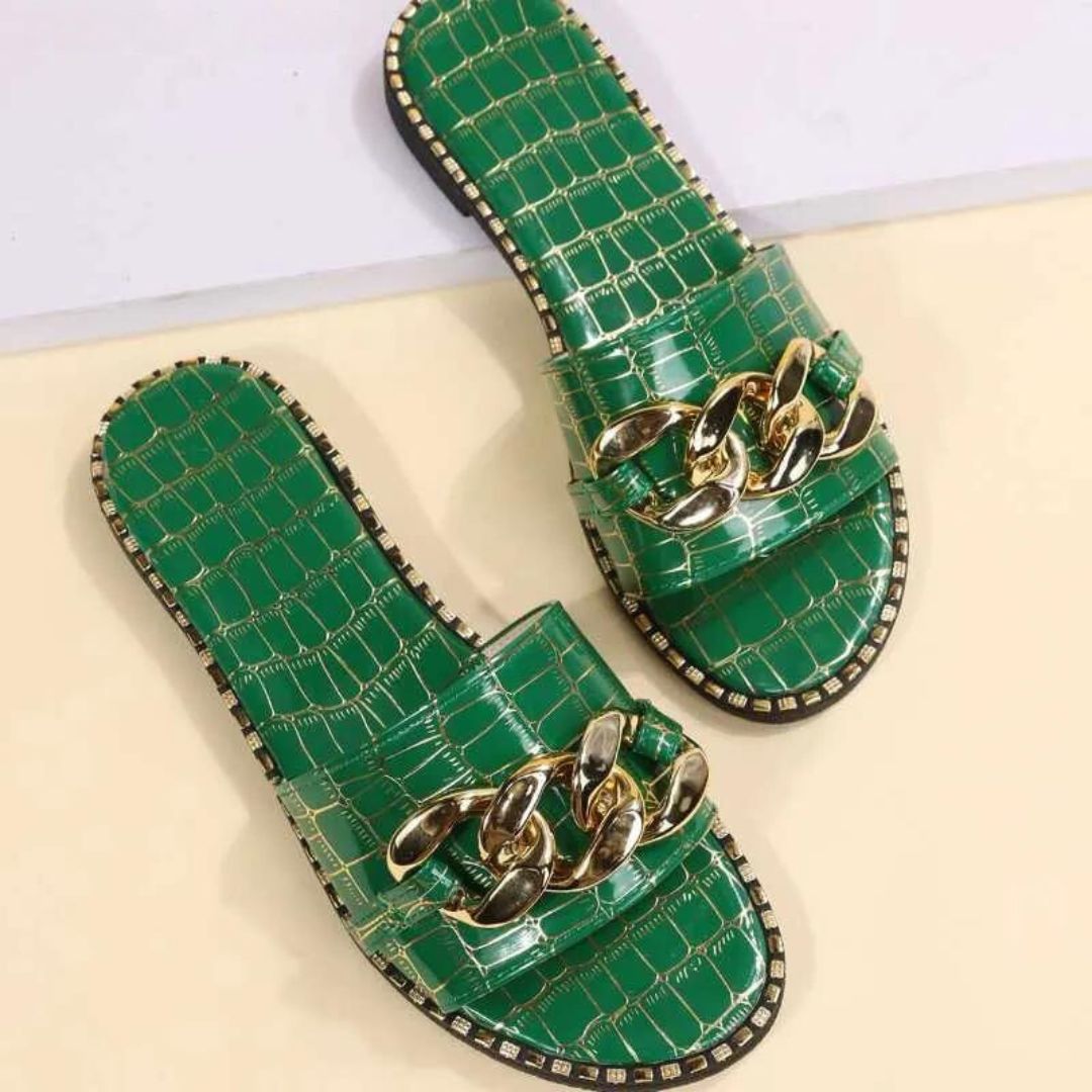 Mules with crocodile pattern