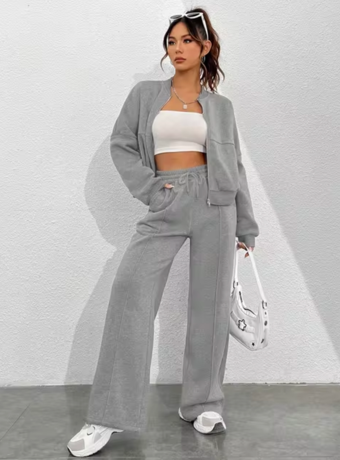 Set of jacket and zipped sweatpants