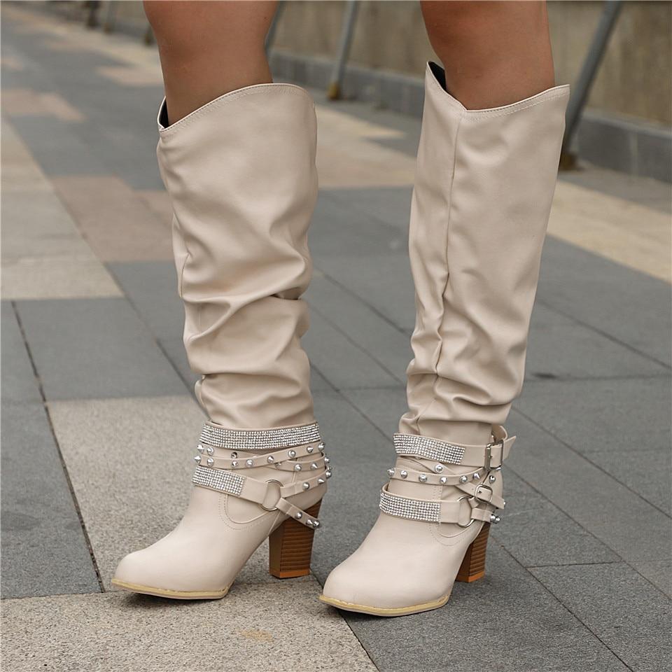 Elegant leather boots with block heel