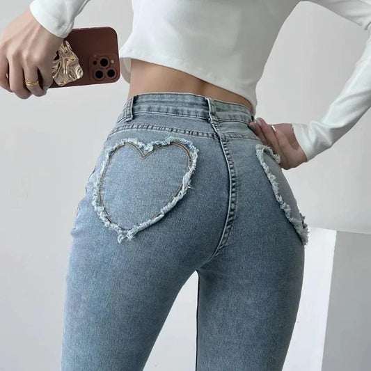 High-waisted jeans with heart fringes