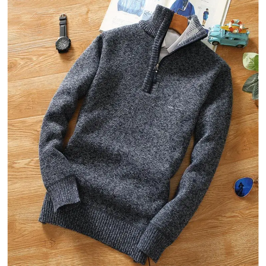 Warming knitted pullover with stand-up collar and zip fastening