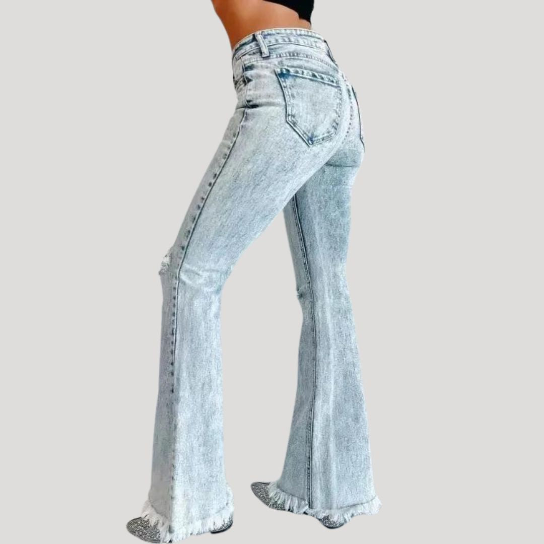 Flared jeans with rips