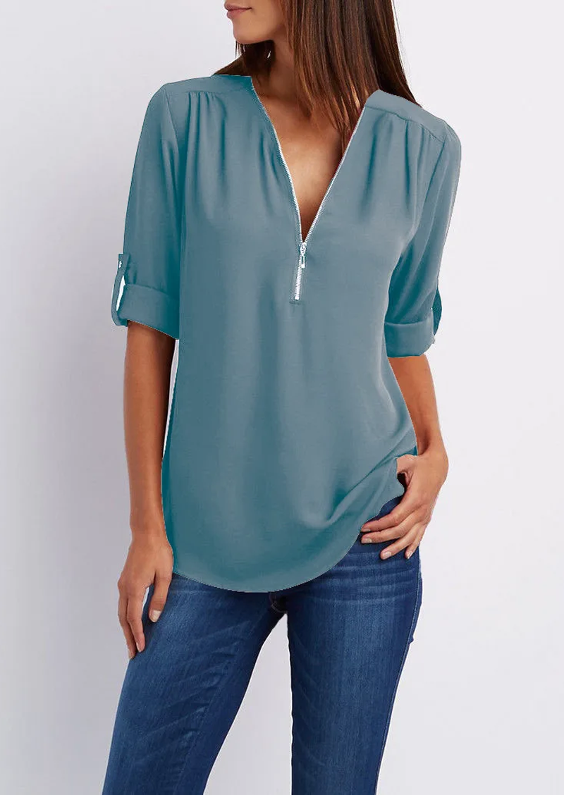 Blouse with V-neck and zip fastening