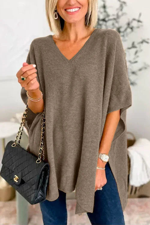 Sweater with irregular hem and V-neckline