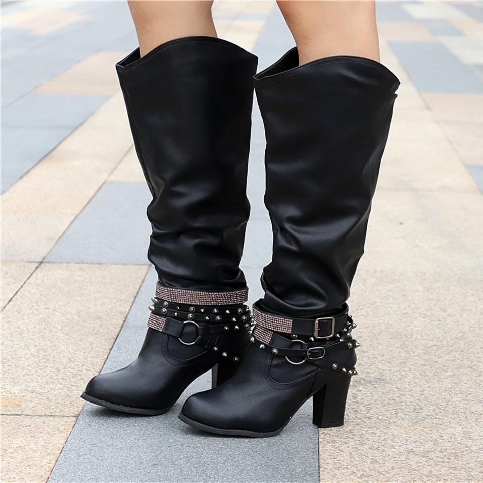 Elegant leather boots with block heel