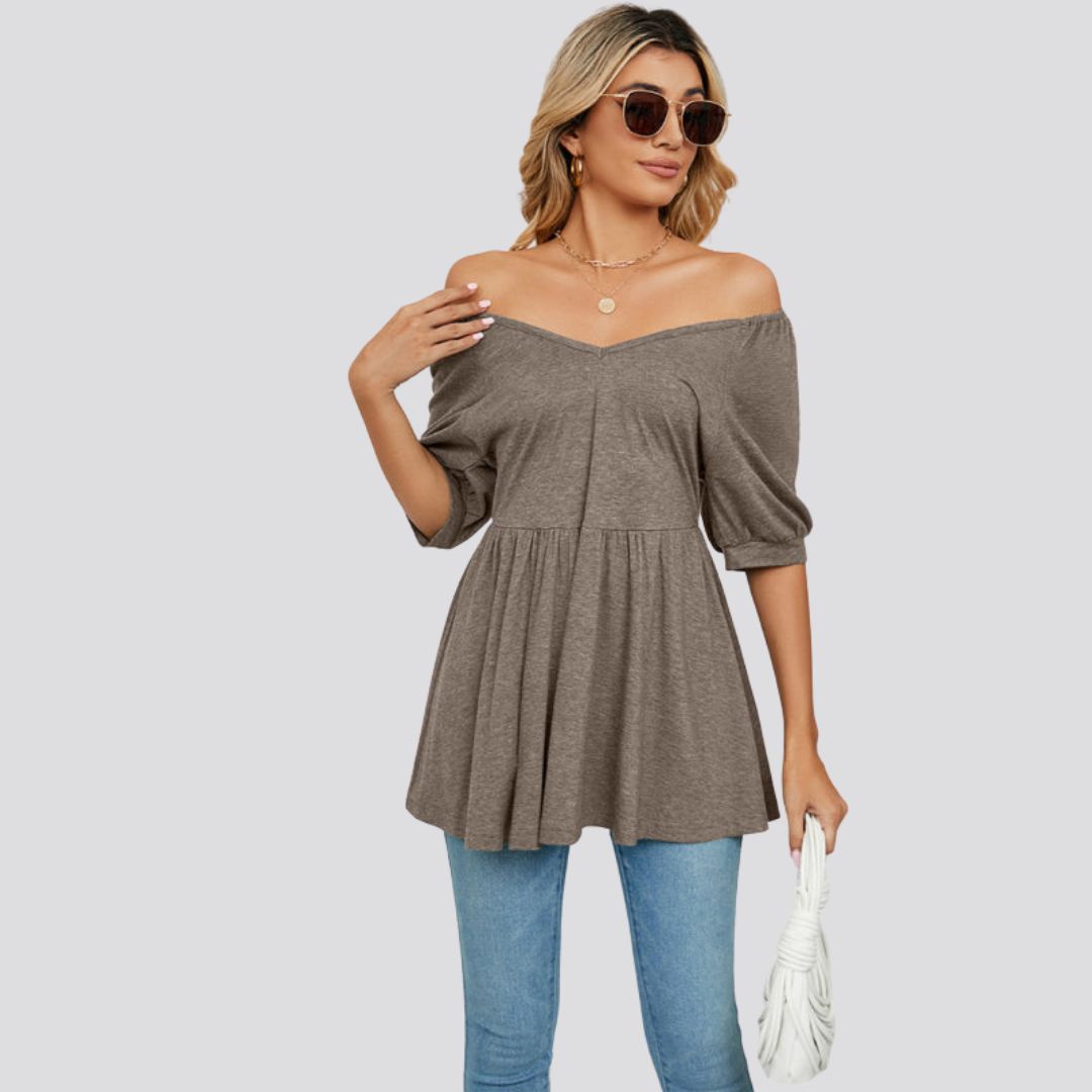 Wide flared peplum top with V-neckline