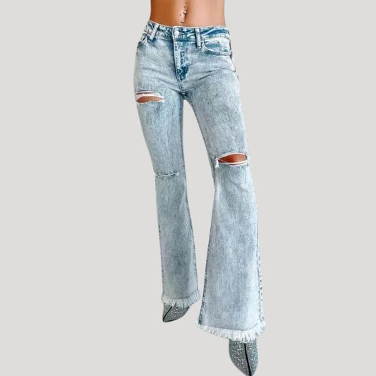 Flared jeans with rips