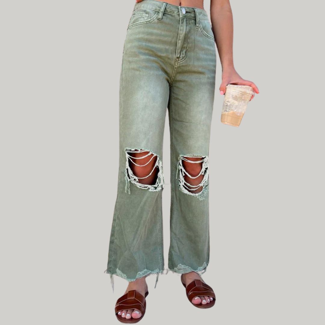 Flared jeans with distressed knees