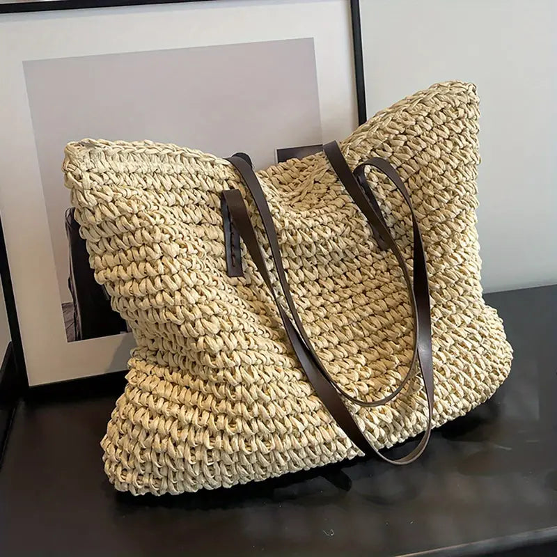 Woven carrier bag with leather straps