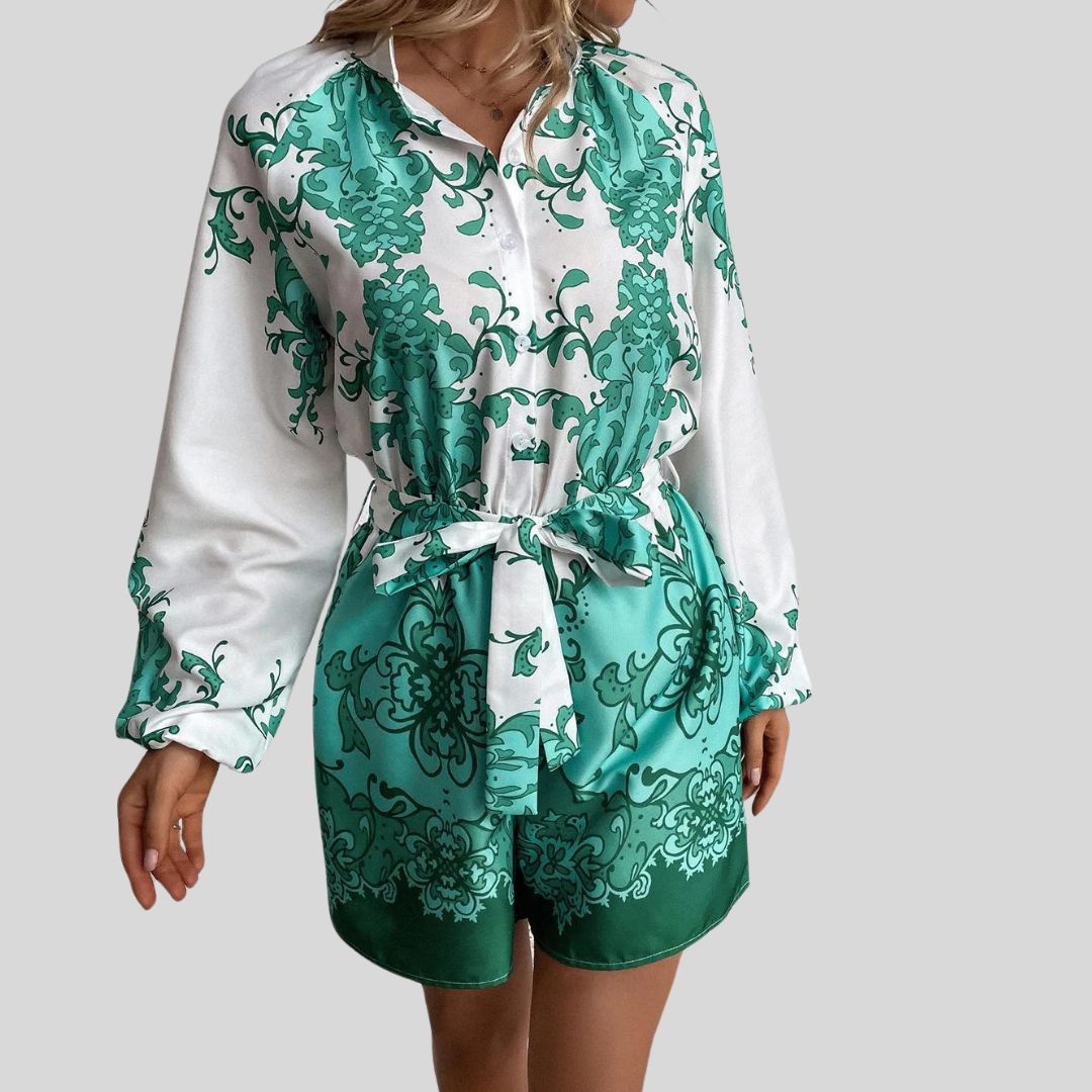 Chic playsuit with floral print and waistband