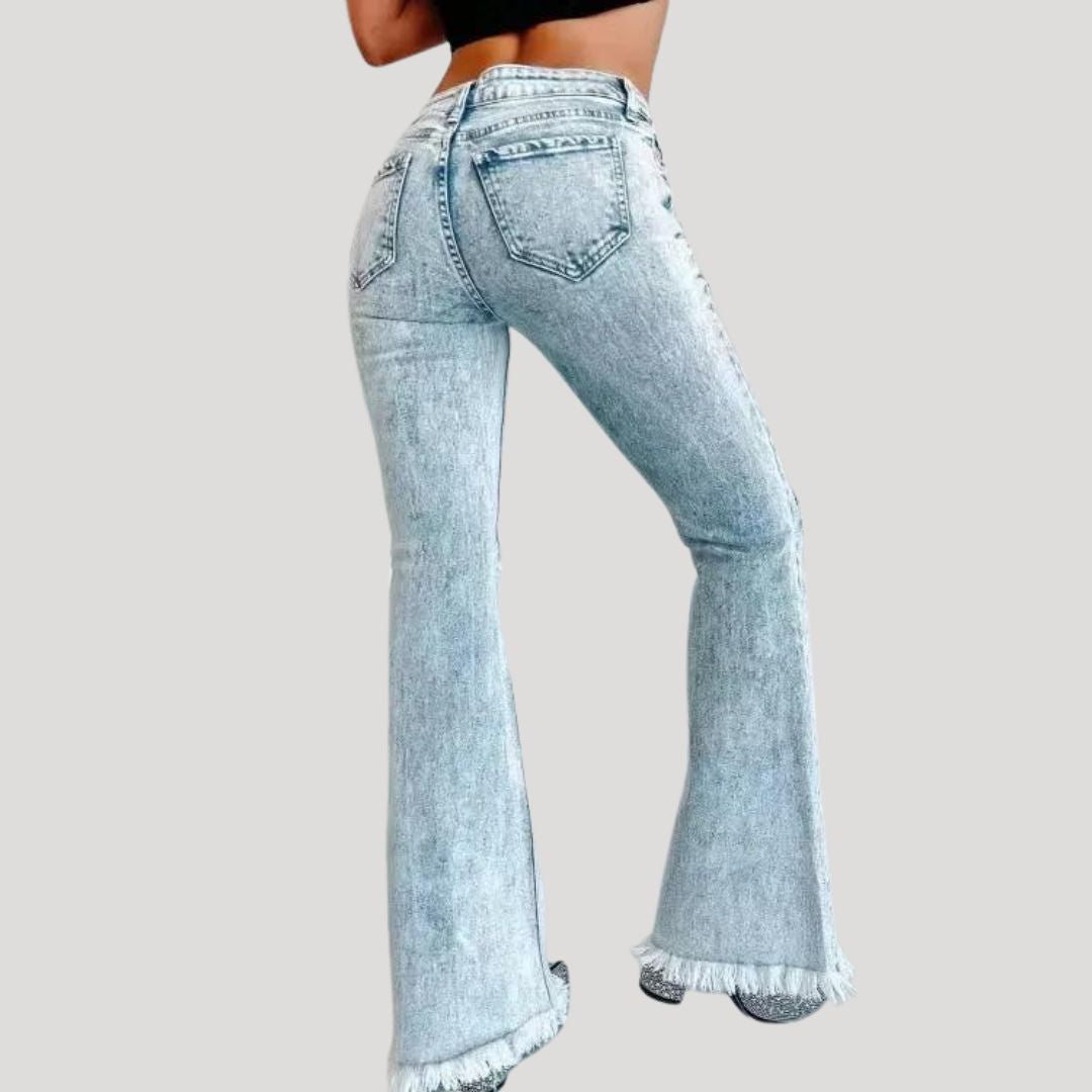 Flared jeans with rips