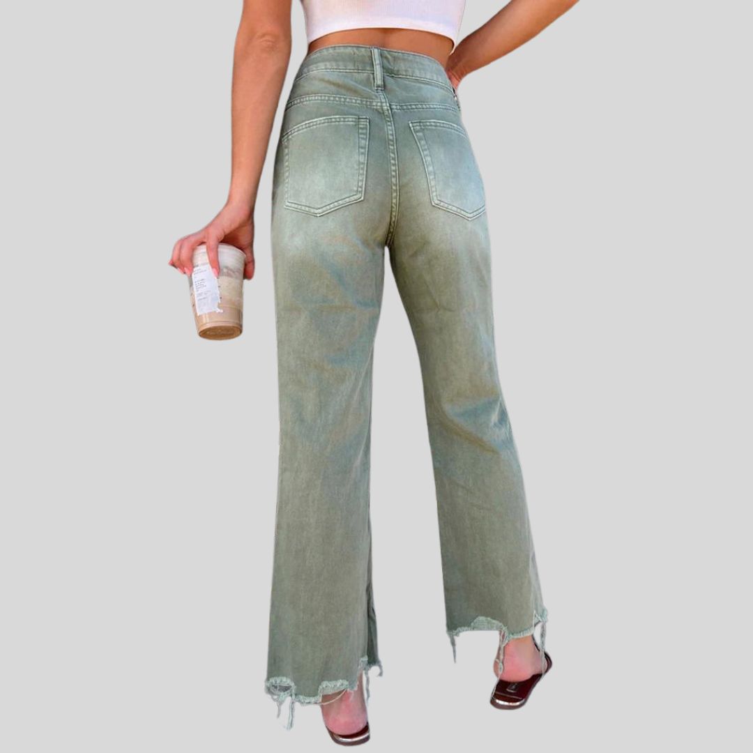 Flared jeans with distressed knees