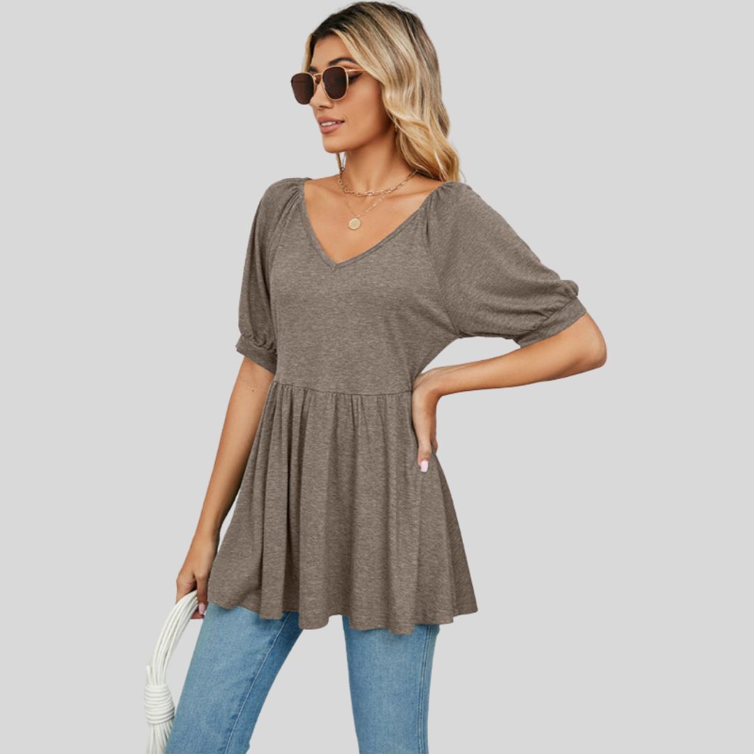 Wide flared peplum top with V-neckline