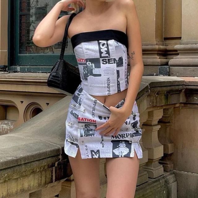 Off-the-shoulder playsuit with newspaper print