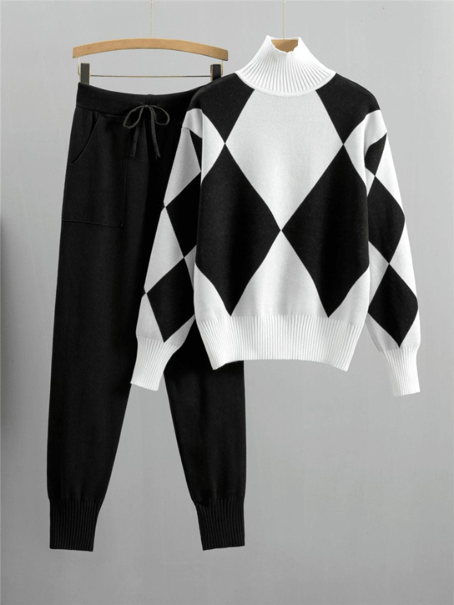 Elegant ladies jumper and trousers set