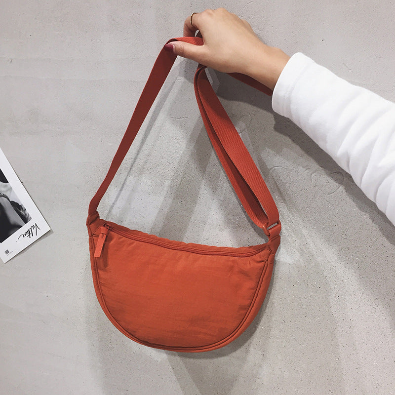 Crescent shaped bag