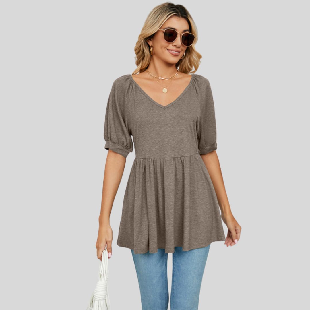 Wide flared peplum top with V-neckline