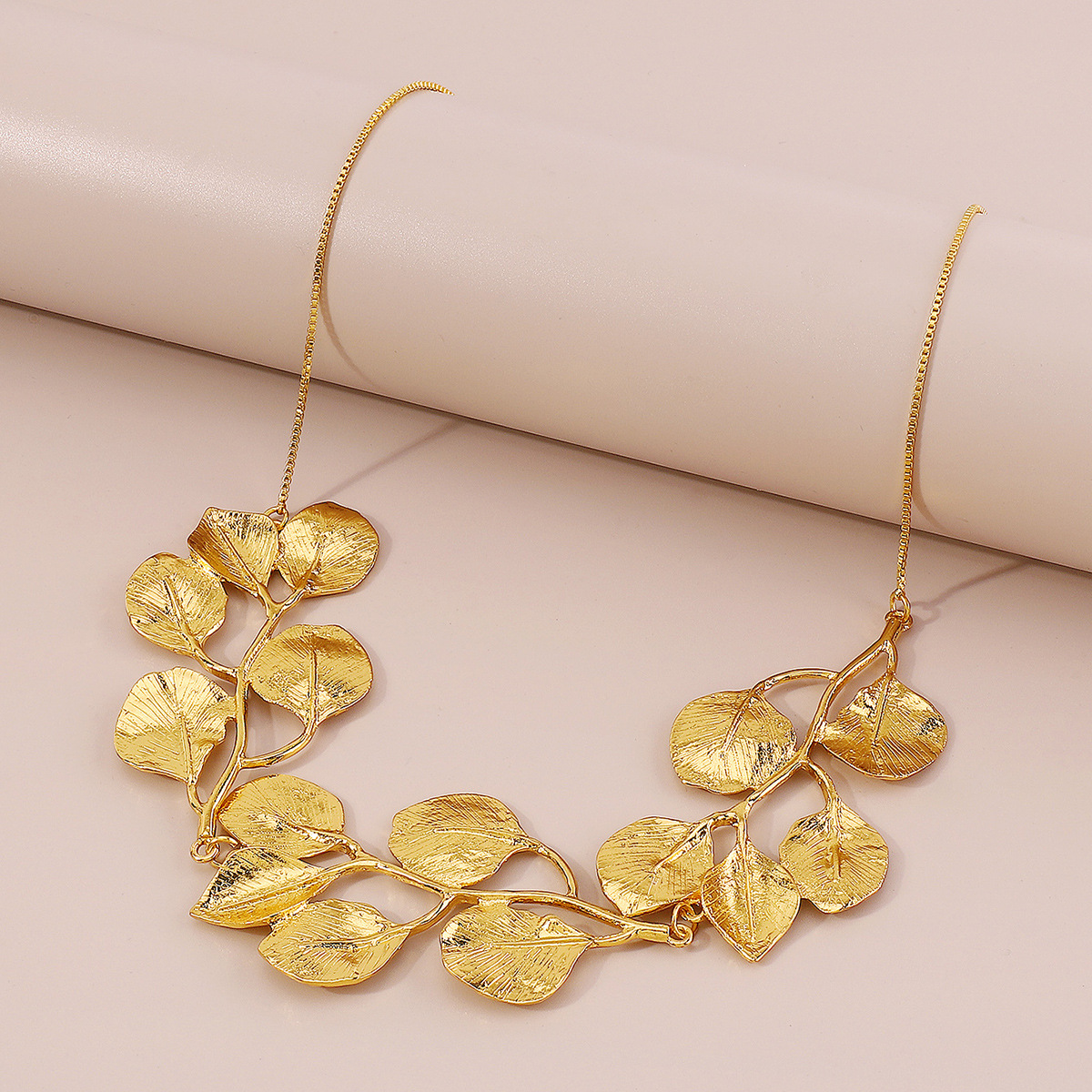 Golden vintage fig leaf necklace