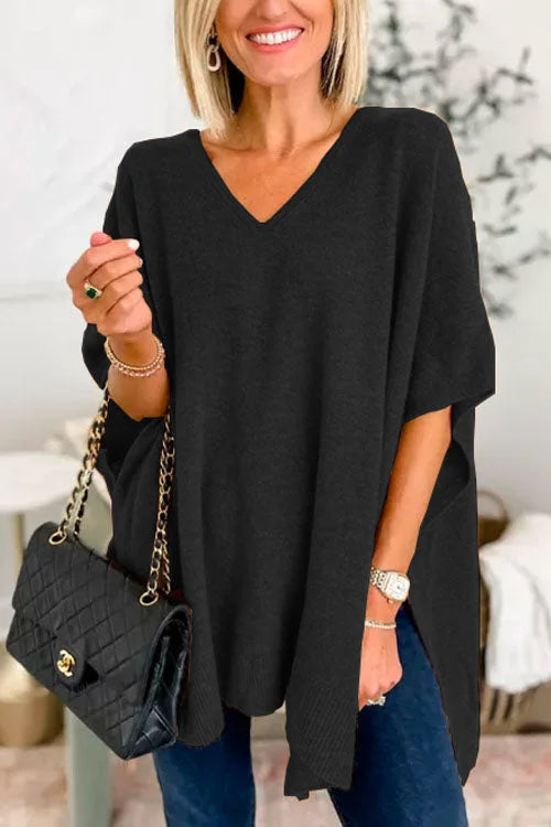 Sweater with irregular hem and V-neckline