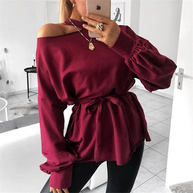 Modern long-sleeved blouse with slanted shoulder