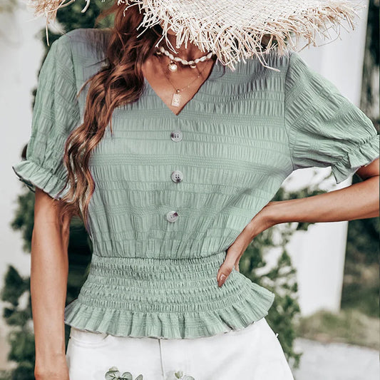 Pleated button-front blouse with peplum